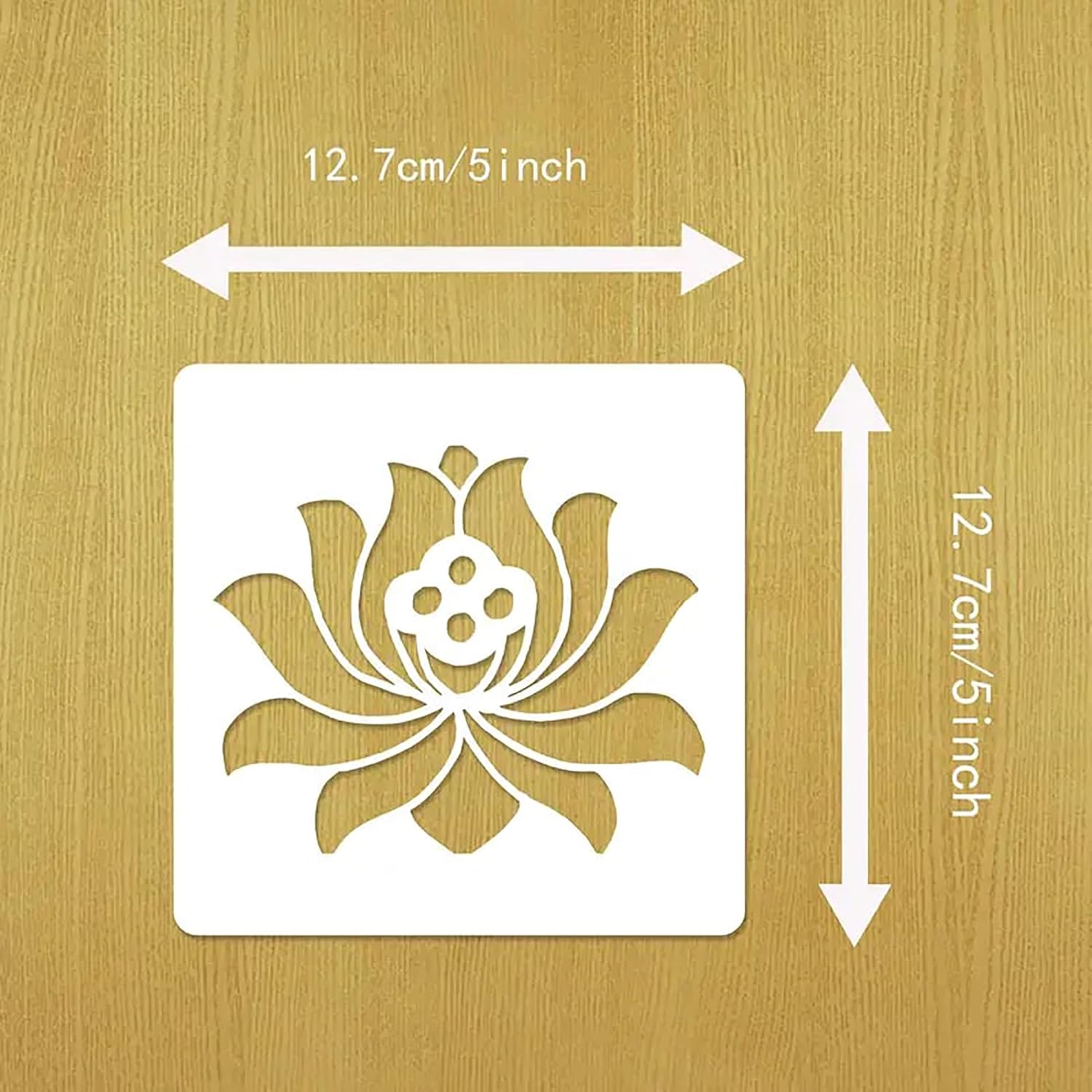 White stenciled design of a flower on a gold background with measurements indicated.