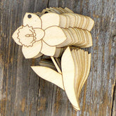 Wooden flower cutouts on a wooden surface