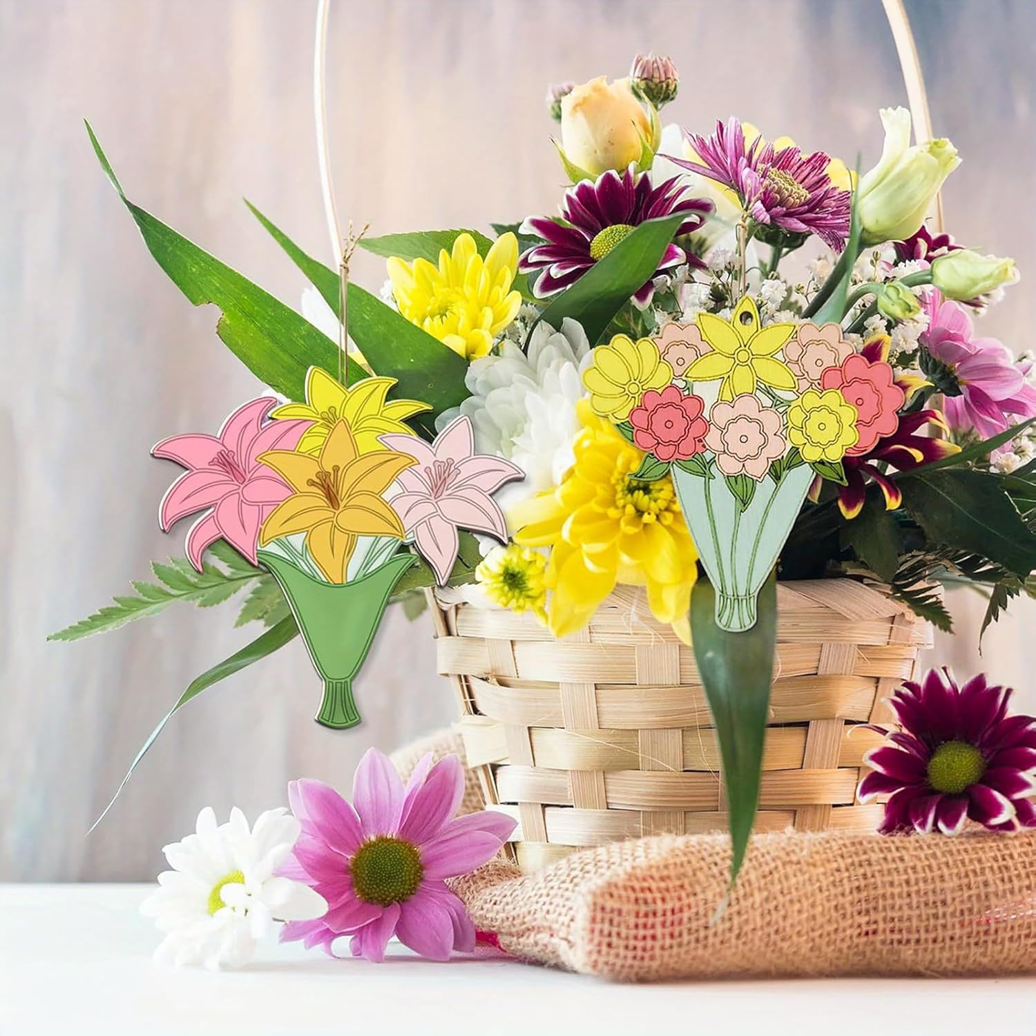 Floral decorations with a basket and flowers on a light background