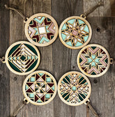 Set of six geometric wooden ornaments on a wooden background