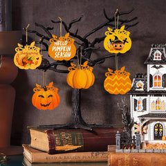 Halloween-themed decorations including pumpkins and a haunted house on a dark background.