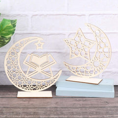 Decorative wooden moon and star designs on stands against a light background