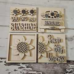 Wooden wall art pieces with sunflower designs and text on a rustic wooden background.