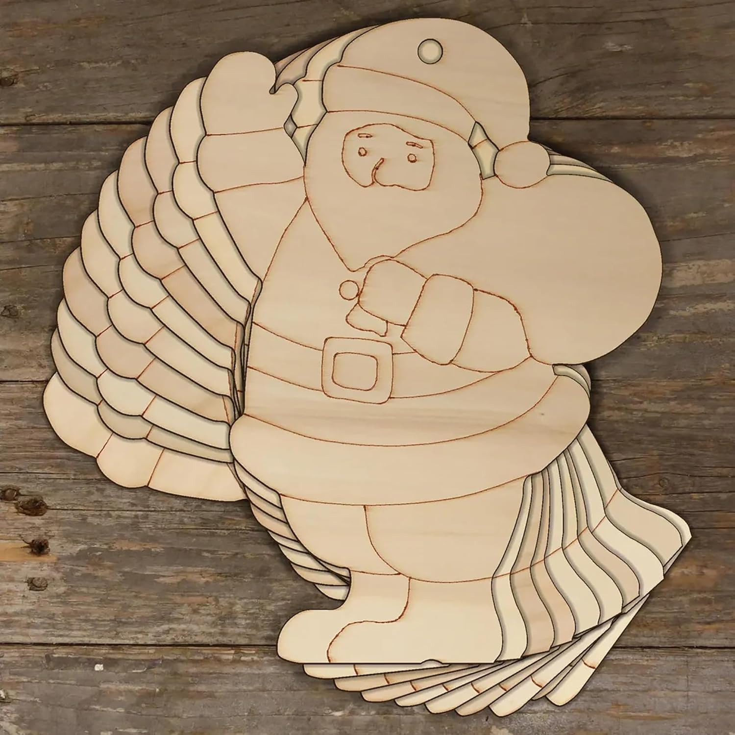Wooden cutout of a Santa Claus figure on a wooden surface