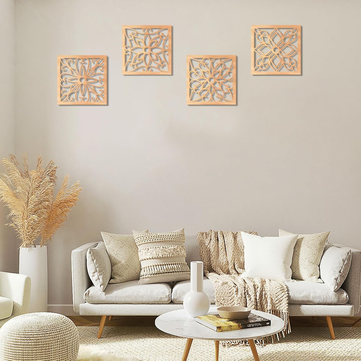 Living room with a beige sofa, decorative pillows, and wall art.
