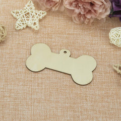 Bone-shaped wooden tag on a textured fabric background with decorative elements.