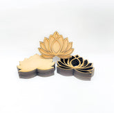 Wooden lotus flower cutouts on a white background