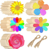 Colorful wooden flower-shaped decorations with tassels on a white background