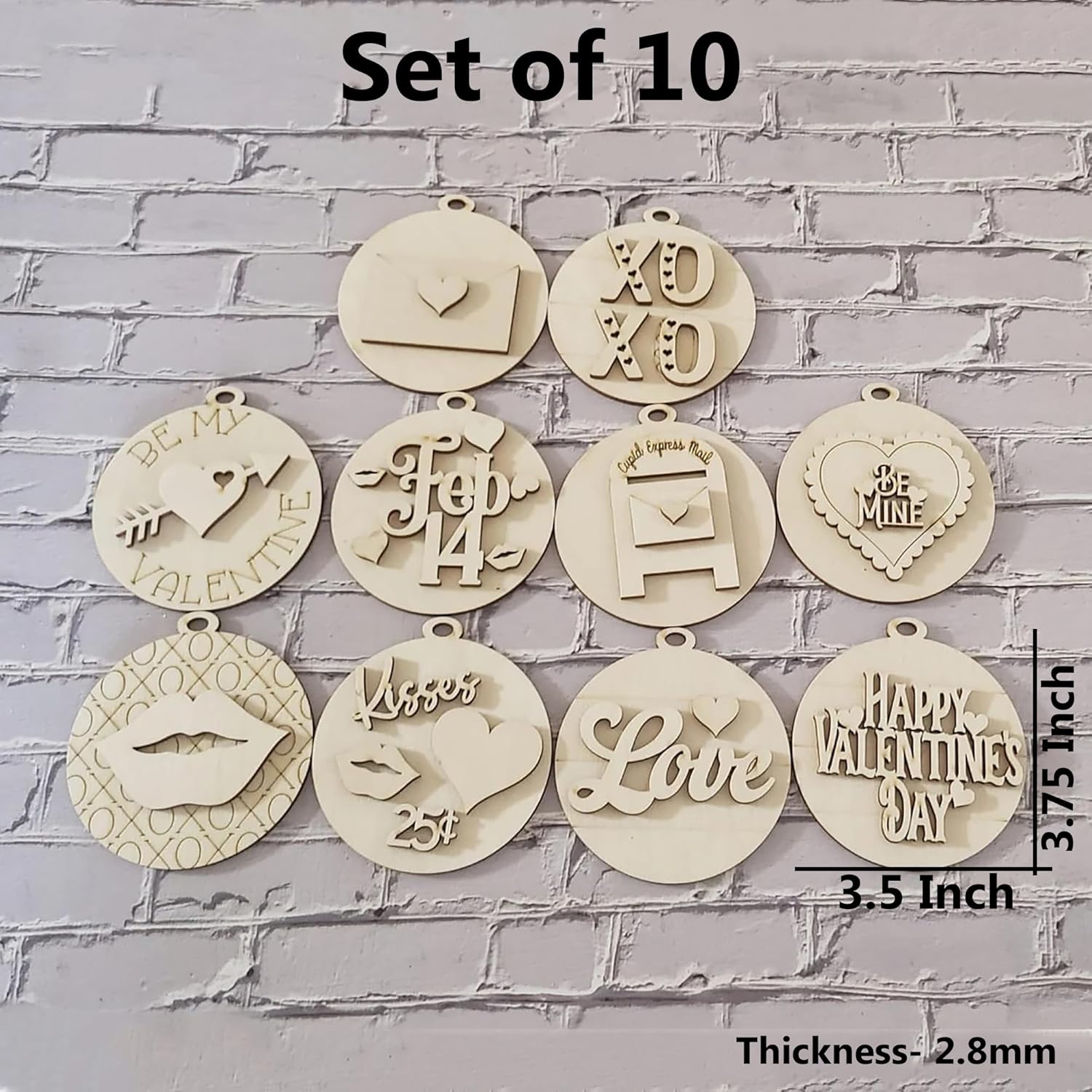 Set of 10 decorative wooden plaques with various engravings on a gray brick wall background.
