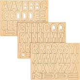 Set of wooden letter shapes on a white background