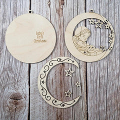 Wooden ornaments with moon and star designs on a wooden surface