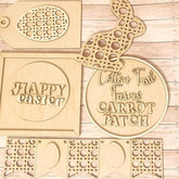 Wooden Easter-themed cutouts with 'Happy Easter' and 'Cotton Tail Farms Carrot Patch' text on a wooden background.