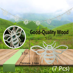 Decorative bee-shaped wooden cutouts with measurements and text on a natural background