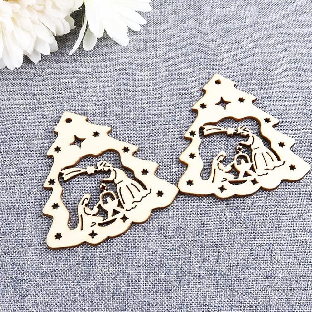 Two wooden nativity scene cutouts on a gray fabric background.
