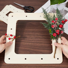Wooden frame with decorative flowers on a wooden table