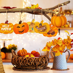 Decorative setup with pumpkins, a basket of fruits, and a vase with flowers on a table.