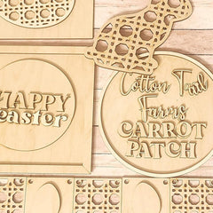 Wooden Easter decorations with 'Happy Easter' and 'Cotton Tail Farms Carrot Patch' text on a wooden background.