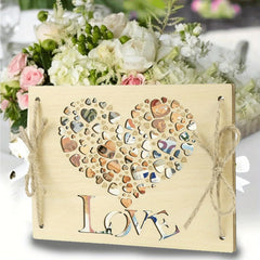 Decorative card with heart design and 'LOVE' text, tied with twine, against a floral background.