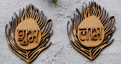 Two wooden signs with decorative designs and text on a light gray background