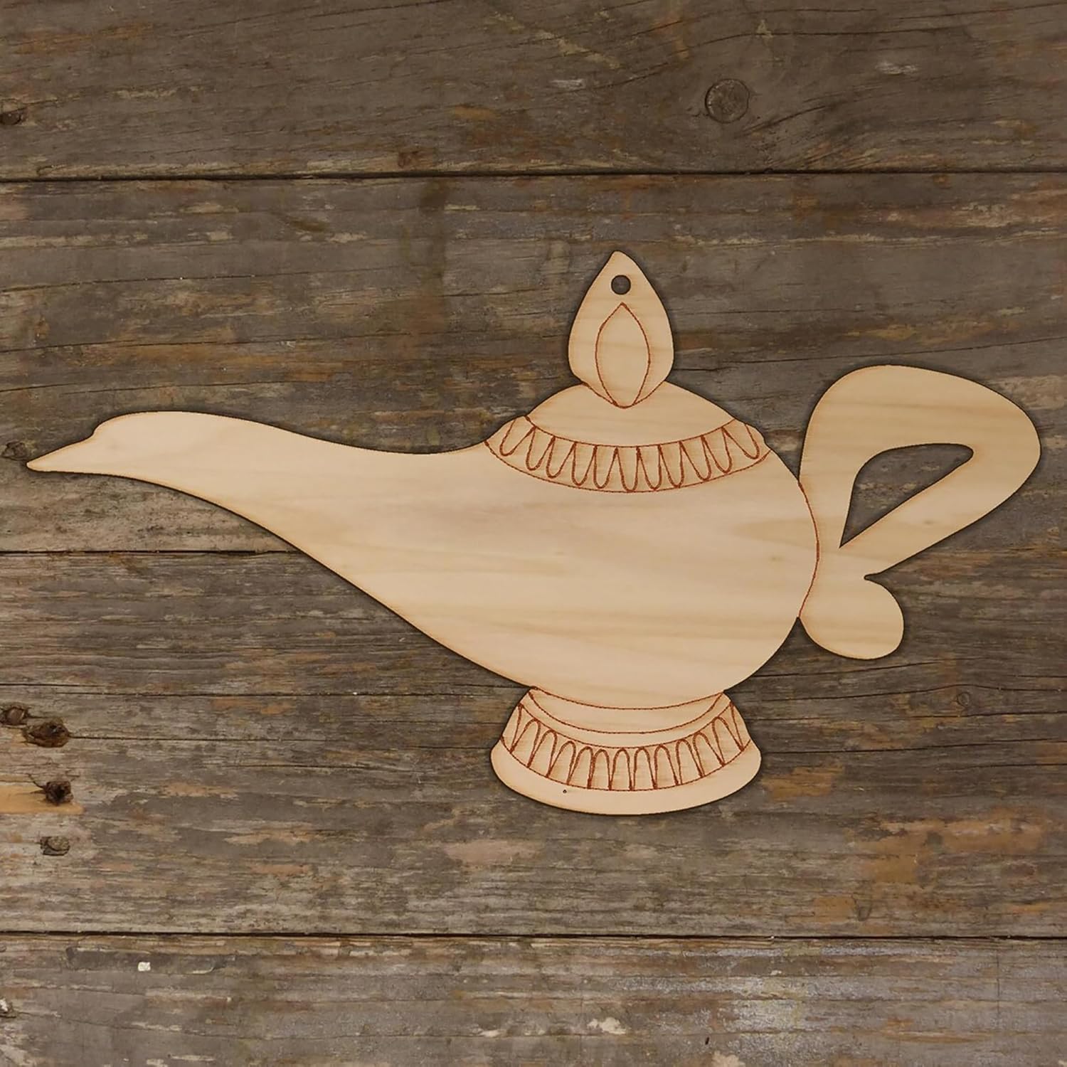 Wooden genie lamp decoration on a wooden surface