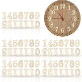 Wooden wall clock with decorative numbers on a white background