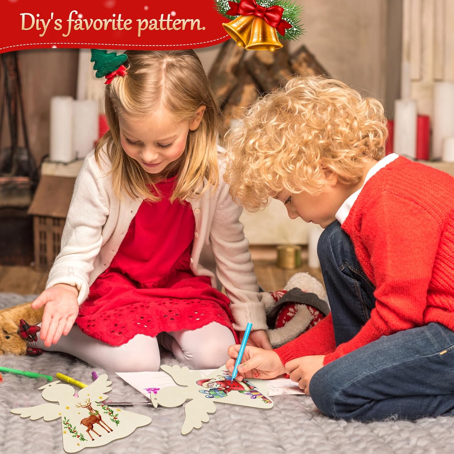 Two children making Christmas crafts on a carpeted floor.