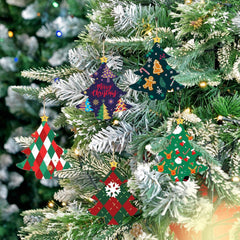 Colorful Christmas tree-shaped ornaments on a decorated Christmas tree.