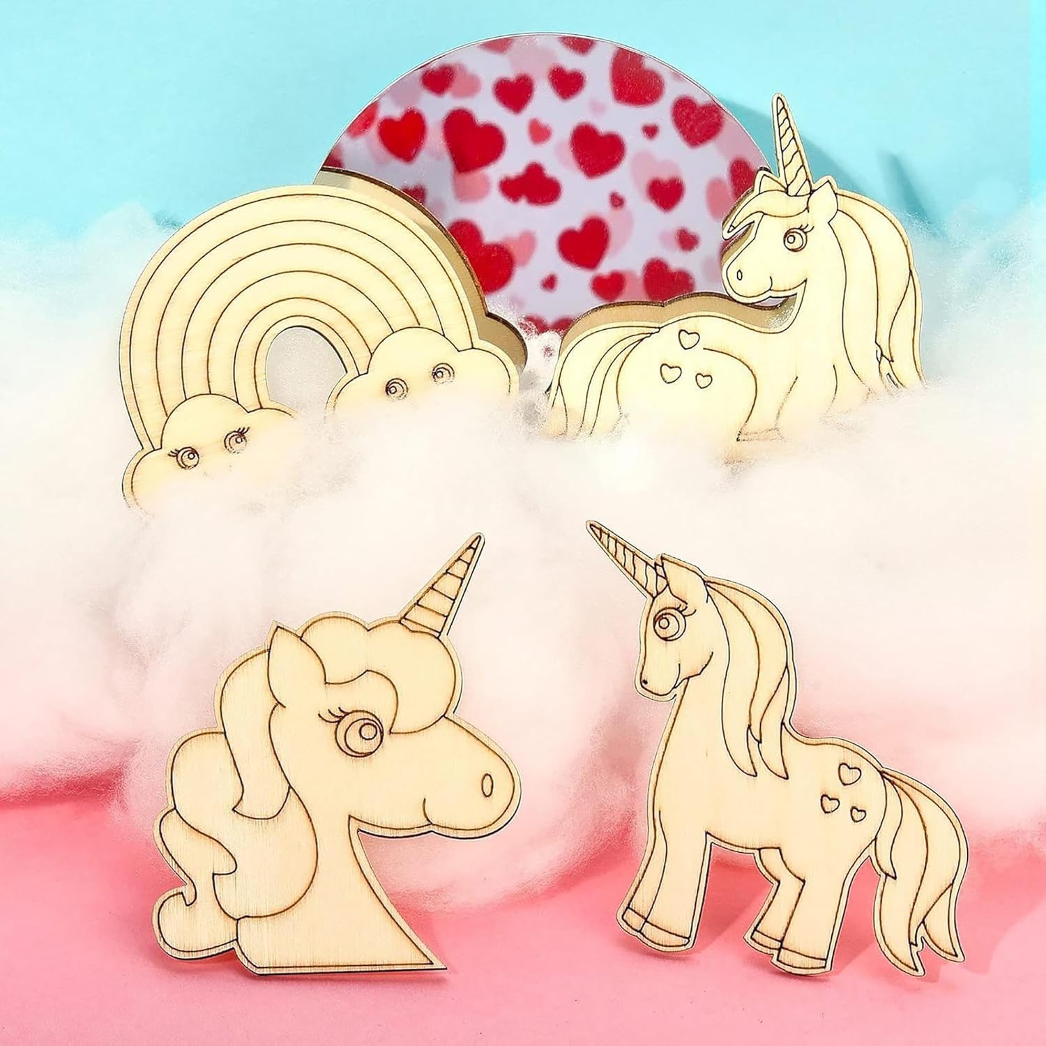 Set of unicorn and rainbow-shaped wooden pins on a colorful background with heart pattern.