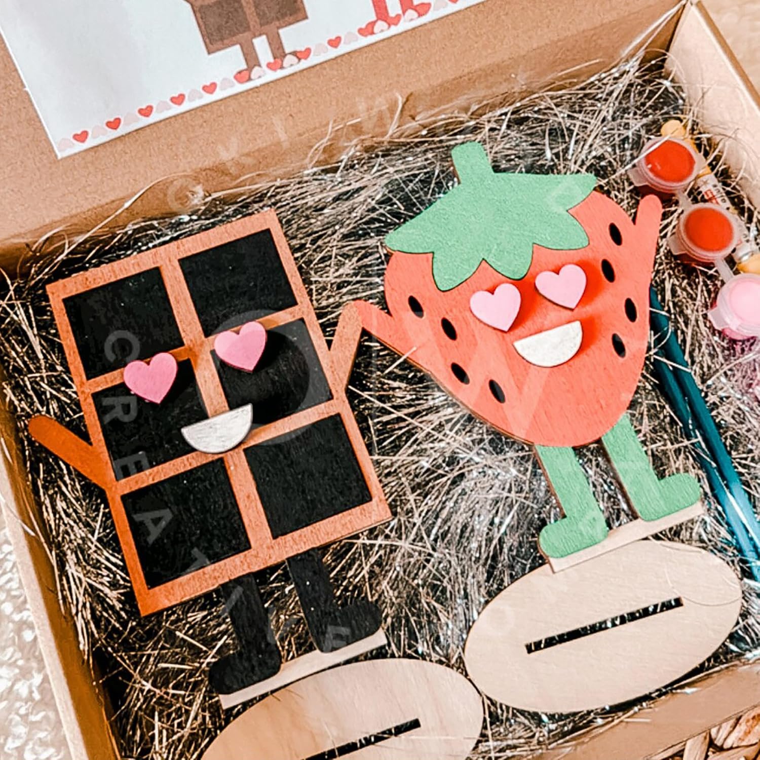 Craft kit with strawberry-shaped card and blackboard-style card in a box
