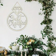 handcrafted timber "just engaged" party decoration