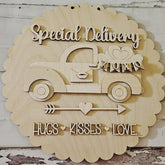 Wooden decorative sign with a truck, hearts, and text on a rustic background