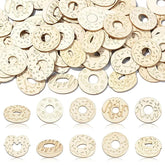 Wooden donut-shaped cutouts with various designs on a white background