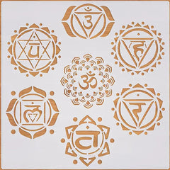 Set of gold chakra symbols on a white background
