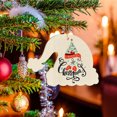 Decorative Christmas ornament with 'Merry Christmas' text on a lit candle background.
