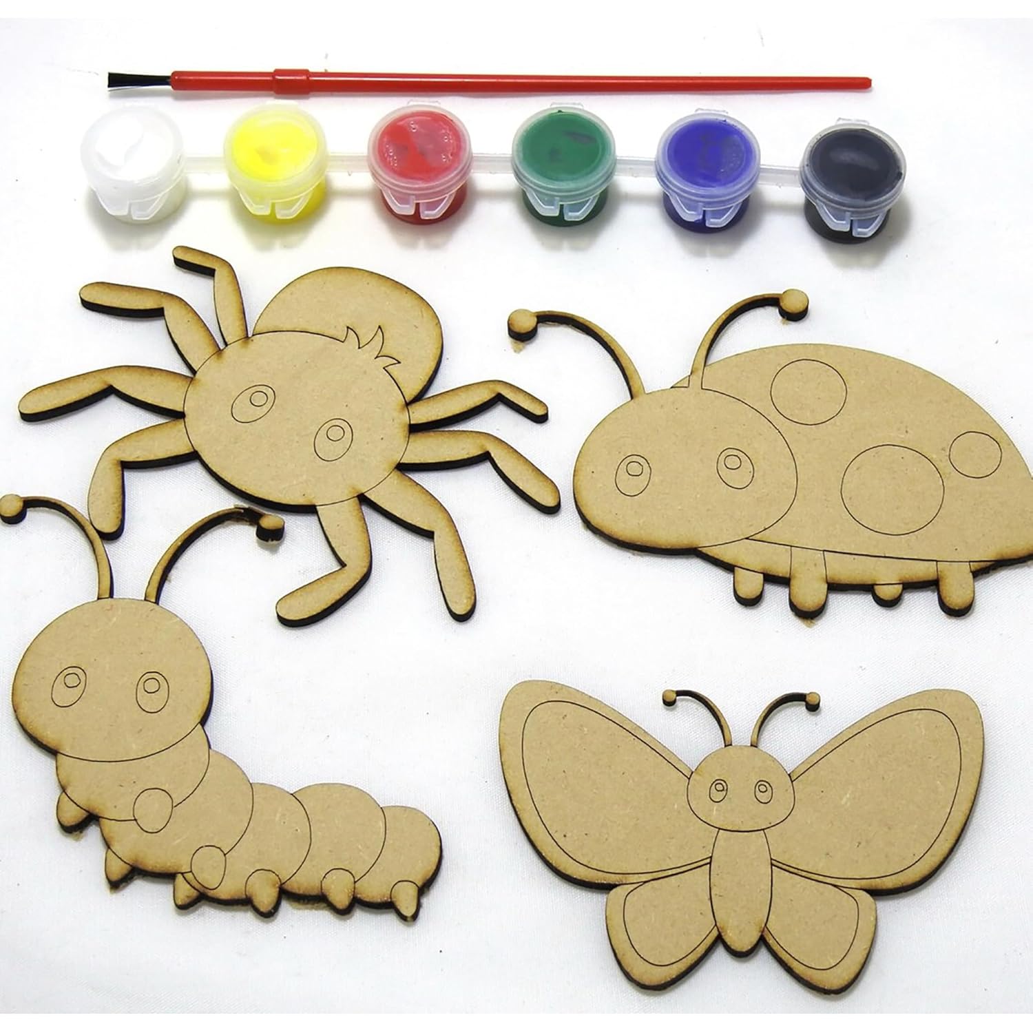 Cardboard insect shapes with paint containers and a brush on a white background