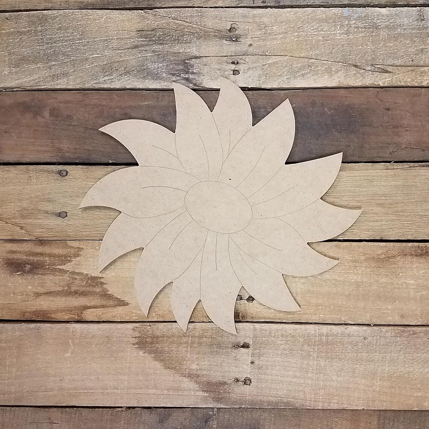 Wooden sunflower wall decor on a rustic wooden background