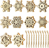 Wooden snowflake ornaments and sticks on a white background