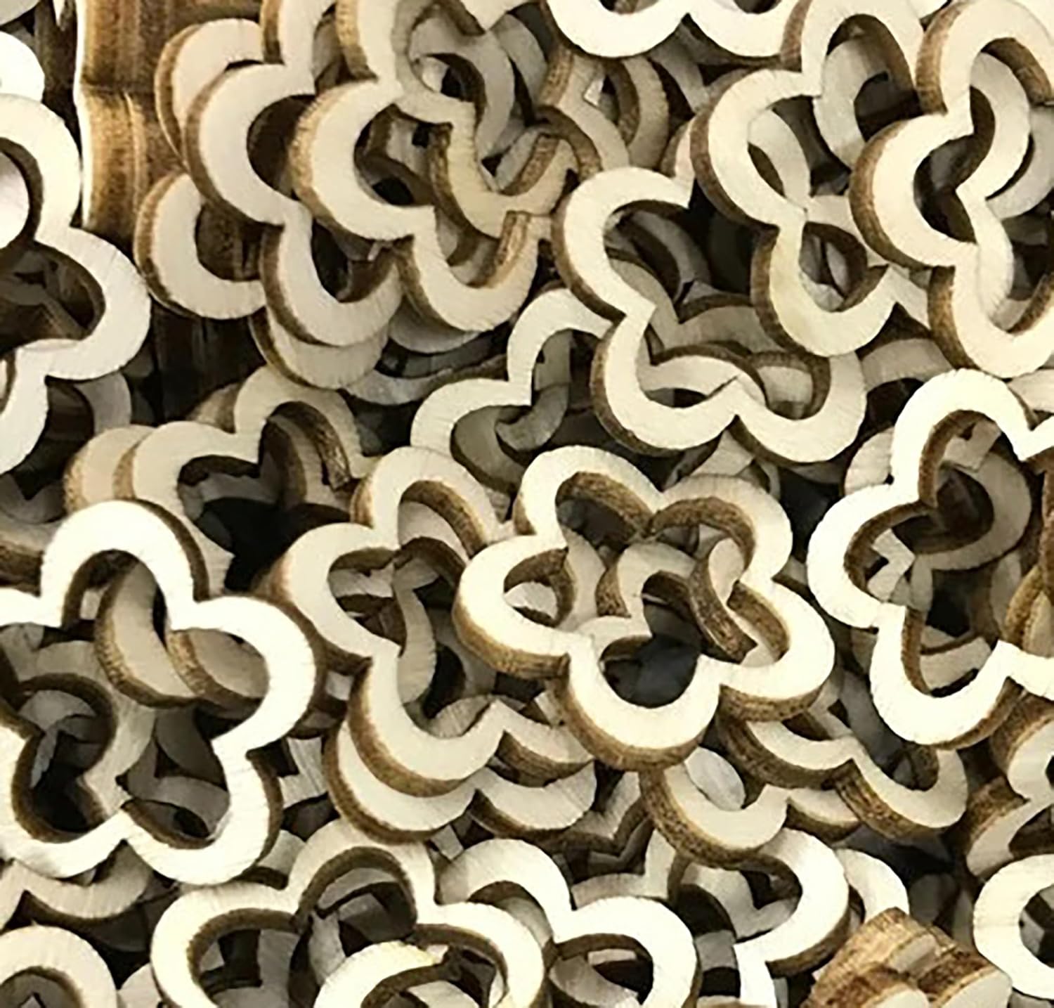 Close-up of wooden interlocking puzzle pieces.
