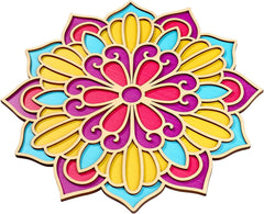 Colorful mandala design with yellow, pink, blue, and purple colors on a white background.