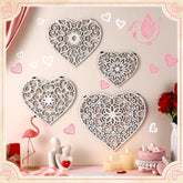 Decorative heart-shaped wall art pieces on a wall with decorative elements.