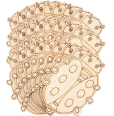Stack of wooden ladybug shapes on a white background