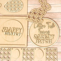 Wooden Easter-themed cutouts with 'Happy Easter' and 'Cotton Tail Farms Carrot Patch' text on a wooden surface.