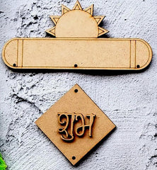 Wooden decorative items with sun design and engraved text on a textured surface