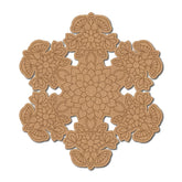 Decorative brown paper doily with floral patterns on a white background