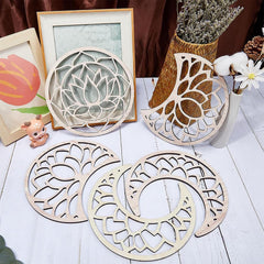 Decorative wooden coasters with intricate patterns on a white surface.