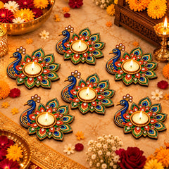 Diwali table decoration with peacock diya holders