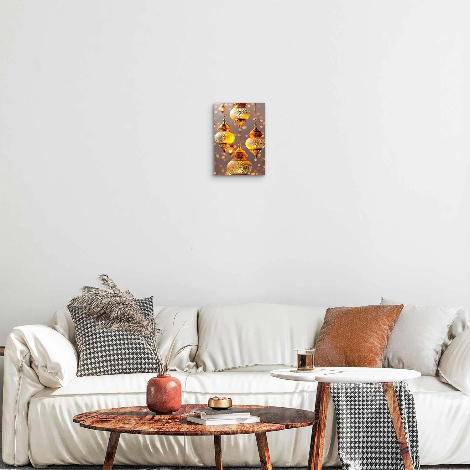 Living room with a white sofa, wooden coffee table, and wall art.