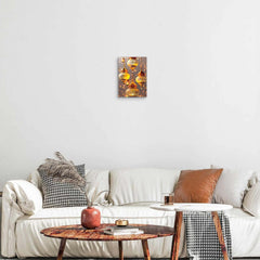 Living room with a white sofa, wooden coffee table, and wall art.