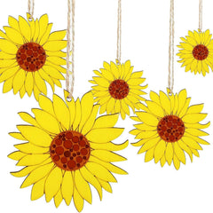 Set of yellow sunflower decorations hanging on a white background
