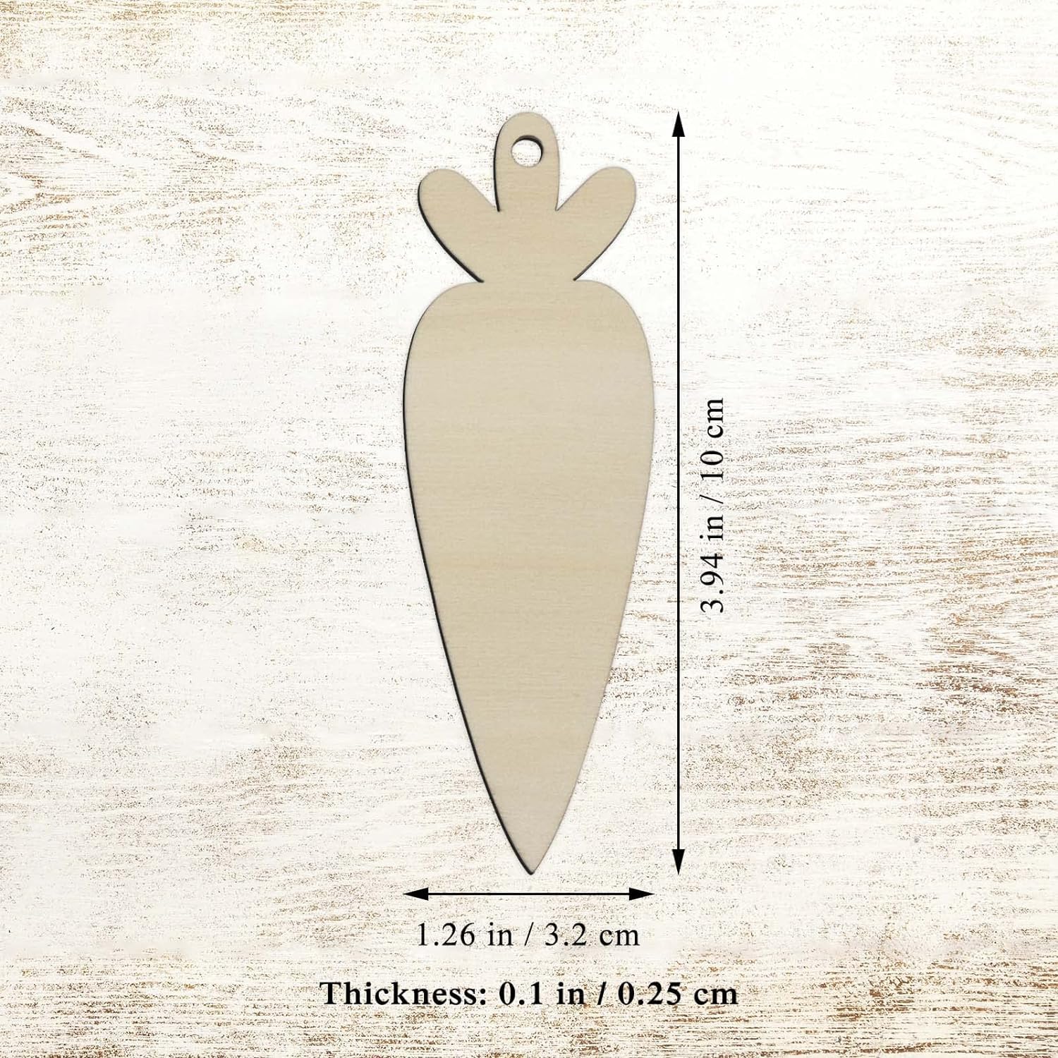 Carrot-shaped wooden pendant with measurements on a light wood background